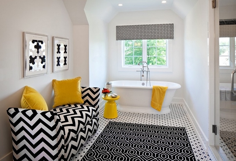 Yellow is a bold accent color in a black and white bath.