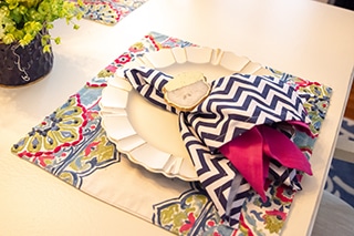 Place setting in navy and hot pink.