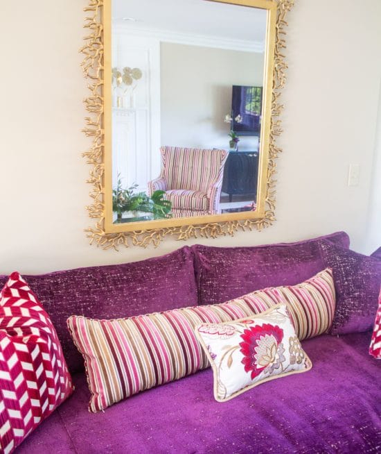 purple couch in home makeover